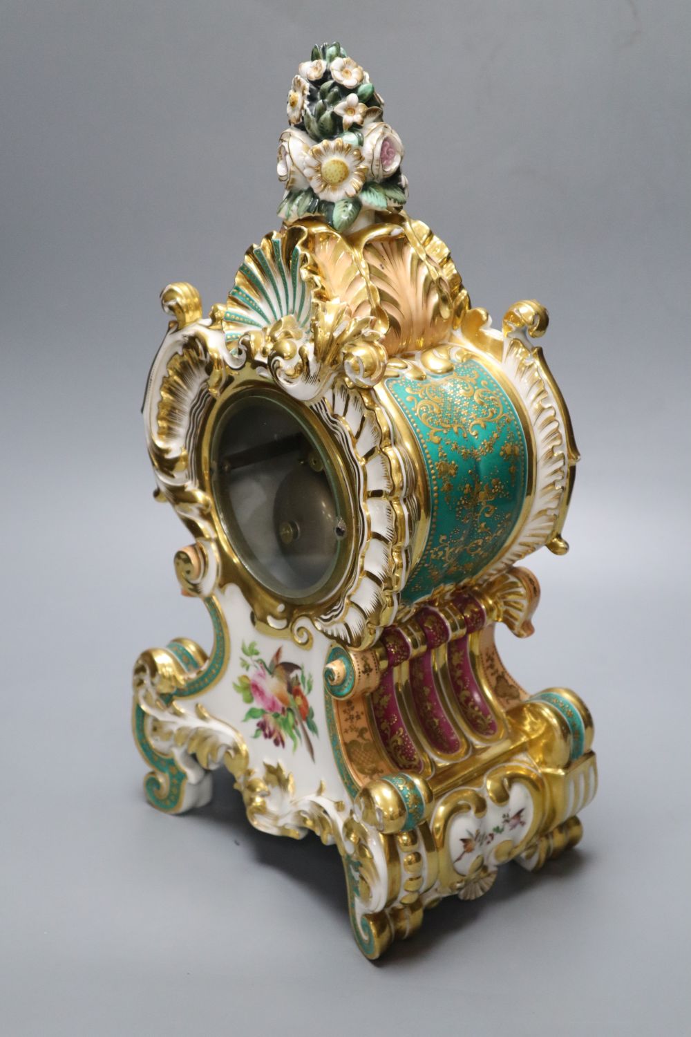 A late 19th century French porcelain mantel clock, with French movement, countwheel striking on a bell, height 40cm